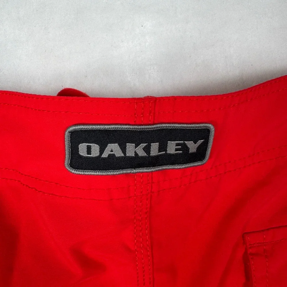Oakley Board Shorts Mens Size 40 Red Spell Out Graphic Surf Swim Trunks